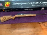 THOMPSON CENTER ARMS R-55, 17 MACH 2 CAL. SEMI AUTO, BLUE WITH BROWN LAMINATE STOCK, LIKE NEW IN THE BOX - 1 of 5