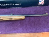 THOMPSON CENTER ARMS R-55, 17 MACH 2 CAL. SEMI AUTO, BLUE WITH BROWN LAMINATE STOCK, LIKE NEW IN THE BOX - 4 of 5
