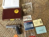 COLT DELTA “ELITE” 10MM CAL., 5” BARREL, STAINLESS, NEW UNFIRED IN THE BOX OWNERS MANUAL, HANG TAG, ETC.