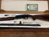 REMINGTON 870 WINGMASTER 20 GA., 26” REM CHOKE BARREL, ENHANCED RECEIVER, UNFIRED IN THE BOX WITH OWNERS MANUAL, 3 CHOKE TUBES & WRENCH - 1 of 4