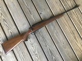 REMINGTON MODEL 7, 7 MM-08 CAL., WALNUT STOCK, 99% COND. - 1 of 9