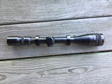 SOLD WEAVER
V-12-1, 4X-12X VARIABLE, WITH 50 YRD TO 1,000 YRD. OUTSIDE OBJECTIVE, REG CROSS HAIRS RETICLE, RIFLE SCOPE, OLDER SCOPE MFG. IN THE USA. - 1 of 3