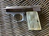 BROWNING BELGIUM “BABY” 25 AUTO, LIGHTWEIGHT ALUMINUM FRAME, BRIGHT NICKEL, GOLD TRIGGER, PEARLITE GRIPS, NEW UNFIRED IN BROWNING ZIPPER POUCH - 4 of 5