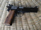 SOLD———-BROWNING BELGIUM HIGH POWER 9 MM, MFG. 1970, RING HAMMER, COMES WITH BROWNING ZIPPER CASE WITH RED INTERIOR ALL IN HIGHCO ND. - 2 of 4
