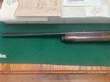 REMINGTON 1100 “ONE OF 3,000 THOUSAND” LIMITED EDITION 12 GA., MFG. 1970, #1925 of 3,000, NEW IN THE BOX WIITH ORIGINAL SALES BILL - 5 of 5