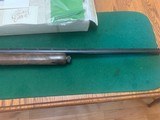 REMINGTON 1100 “ONE OF 3,000 THOUSAND” LIMITED EDITION 12 GA., MFG. 1970, #1925 of 3,000, NEW IN THE BOX WIITH ORIGINAL SALES BILL - 4 of 5