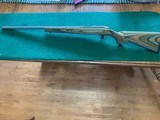 RUGER 77, 22 HORNET CAL. ALL WEATHER, STAINLESS BARREL WITH BEAUTIFUL LAMINATED STOCK, HIGH COND - 1 of 5