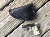 BROWNING BELGIUM BABY 25 AUTO, BRIGHT NICKEL, GOLD TRIGGER, EXC. COND. WITH BROWNING ZIPPER POUCH - 4 of 4