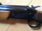 SAVAGE 24 DELUXE, 22 LR. OVER 410 GA., BLUE ENGRAVED RECEIVER WITH GROUSE IN FLIGHT, ON
ONE SIDE, RED FOX ON THE OTHER SIDE, GOLD TRIGGER, LIKE NEW - 9 of 9