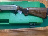 REMINGTON 1100 PREMIER SPORTING 12 GA., NICKEL RECEIVER, 28” PORTED BARREL, 4 EXTENDED CHOKE TUBES, LIKE NEW IN THE CASE - 2 of 5