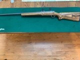 RUGER 77 MARK II, 22-250 CAL., 26” HEAVY BARREL, GRAYED STAINLESS ACTION WITH BROWN LAMINATE STOCK 99% COND. - 1 of 1