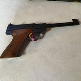 BROWNING CHALLENGER 22 LR., 6 3/4” BARREL, MADE IN BELGIUM IN 1966, BEAUTIFUL CHECKERED
WALNUT GRIPS, APPEARS UNFIRED
MINT WITH BROWNING CASE - 2 of 7