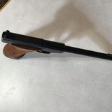 BROWNING CHALLENGER 22 LR., 6 3/4” BARREL, MADE IN BELGIUM IN 1966, BEAUTIFUL CHECKERED
WALNUT GRIPS, APPEARS UNFIRED
MINT WITH BROWNING CASE - 4 of 7