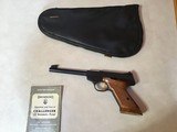 BROWNING CHALLENGER 22 LR., 6 3/4” BARREL, MADE IN BELGIUM IN 1966, BEAUTIFUL CHECKEREDWALNUT GRIPS, APPEARS UNFIREDMINT WITH BROWNING CASE