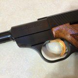 BROWNING CHALLENGER 22 LR., 6 3/4” BARREL, MADE IN BELGIUM IN 1966, BEAUTIFUL CHECKERED
WALNUT GRIPS, APPEARS UNFIRED
MINT WITH BROWNING CASE - 3 of 7