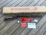 WINCHESTER 94 LEGACY
38-55 CAL. 26” BARREL, TANG SAFETY, NEW IN THE BOX WITH HANG TAG, OWNERS, ETC. - 1 of 8