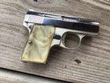 BROWNING BABY BELGIUM, 25 AUTO, BRIGHT NICKEL, WITH GOLD TRIGGER, PEARLITE GRIPS, ALL FACTORY ORIGINAL - 2 of 2