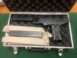 UZI PISTOL 9MM, COMES WITH 5, 32 ROUND MAGS, ONE 20 ROUND MAG, EXC. COND. IN HARD CASE