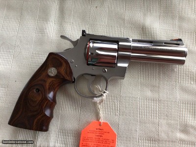 COLT PYTHON 357 MAGNUM “ELITE” 4” BARREL, BRIGHT STAINLESS, NEW UNFIRED IN THE BOX WITH OWNERS MANUAL, HANG TAG, COLTLETTER, ETC. MFG 2003 - Image 2 of 4