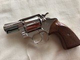 COLT DETECTIVE SPECIAL, 38 SPC. CAL., 2” BARREL, SCARCE BRIGHT NICKEL, NEW UNFIRED IN THE BOX WITH OWNERS MANUAL, HANG TAG - 3 of 4