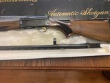 BROWNING A-5, LIGHT-20 GA., 28” MOD CHOKE, MFG. 1981, HAS A SCRATCH ON LEFT SIDE OF THE STOCK, IN THE ORIGINAL BOX - 3 of 5