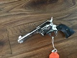 COLT SAA ARMY 45 LC. 4 3/4” BARREL, BRIGHT NICKEL, NEW UNFIRED, UNTURNED 100% COND. IN THE BOX WITH OWNERS MANUAL & HANG TAG - 2 of 4