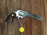 COLT PYTHON 357 MAGNUM 6” BRIGHT NICKEL MFG. 1971, NEW IN THE BOX, NO TURN LINE, COME WITH OWNERS MANUAL, HANG TAG, COLT LETTER, COLT SCREWDRIVER, ETC - 3 of 4