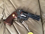 COLT PYTHON 357 MAGNUM, 4” BLUE, MFG. 1974, NEW UNFIRED, UNTURNED IN THE BOX WITH OWNERS MANUAL, COLT LETTER, HANG TAG, ETC. - 2 of 4