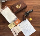 COLT PYTHON 357 MAGNUM, 4” BLUE, MFG. 1974, NEW UNFIRED, UNTURNED IN THE BOX WITH OWNERS MANUAL, COLT LETTER, HANG TAG, ETC.