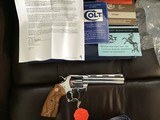 COLT PYTHON 357 MAGNUM “ELITE” RARE BRIGHT STAINLESS, 6” BARREL, NEW UN FIRED, UNTURNED, 100% COND. IN THE BOX WITH OWNERS MANUAL, HANG TAG, ETC. - 2 of 7