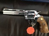 COLT PYTHON 357 MAGNUM “ELITE” RARE BRIGHT STAINLESS, 6” BARREL, NEW UN FIRED, UNTURNED, 100% COND. IN THE BOX WITH OWNERS MANUAL, HANG TAG, ETC. - 3 of 7