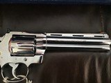 COLT PYTHON 357 MAGNUM “ELITE” RARE BRIGHT STAINLESS, 6” BARREL, NEW UN FIRED, UNTURNED, 100% COND. IN THE BOX WITH OWNERS MANUAL, HANG TAG, ETC. - 4 of 7