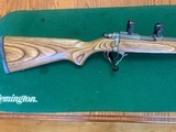 RUGER 77/22 ALL WEATHER 22 MAGNUM, GRAYED STAINLESS, BROWN LAMINATE STOCK, 99% COND.I - 2 of 5