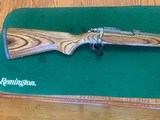 RUGER 77/22 ALL WEATHER 22 LR. GRAYED STAINLESS WITH BROWN LAMINATE STOCK, 99% COND. - 2 of 4