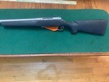 SAVAGE MODEL 12LRPV, 223 CAL., RIGHT HAND BOLT, WITH LEFT HAND PORT, 26” STAINLESS FLUTED BARREL AS NEW IN THE BOX - 2 of 5