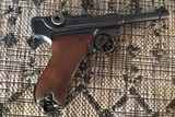 GERMAN LUGER 9MM, MFG. 1937, HAS MATCHING NUMBERS ON THE GUN, HOLSTER HAS 1934. HAS TOOL INSIDE HOLSTER FLAP. - 2 of 5