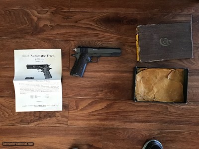 COLT GOVERNMENT 38 SUPER, MFG. 1954, 99+% COND IN THE ORIGINAL BOX WITH OWNERS MANUAL