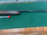 REMINGTON 1100 SPORTING 410 GA. 28” BARREL WITH 4
EXTENDED CHOKE TUBES, EXC. COND - 3 of 5