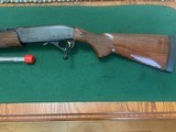 REMINGTON 1100 SPORTING 410 GA. 28” BARREL WITH 4
EXTENDED CHOKE TUBES, EXC. COND - 4 of 5