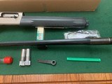 REMINGTON 1100 COMPETITION SYNTHETIC TARGET, 12 GA., 30” WIDE VENT RIB, WITH 5 PROBORE CHOKE TUBES, LIKE NEW IN THE BOX - 4 of 5