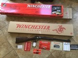 WINCHESTER 9422 22 LR..,HIGH GRADE TRADITIONAL, GOLD HORSE RIDER, 20” BARREL, NEW IN THE BOX WITH SLEEVE & SHIPPING CARTON WITH OWNERS MANUAL, ETC. - 1 of 8