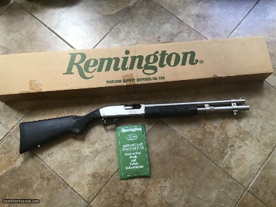 REMINGTON 870 “MARINE” STAINLESS 12 GA. MAGNUM,
18” CYLINDER BORE BARREL, NEW UNFIRED IN THE BOX WITH OWNERS MANUAL, ETC.