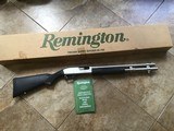 REMINGTON 870 “MARINE” STAINLESS 12 GA. MAGNUM,
18” CYLINDER BORE BARREL, NEW UNFIRED IN THE BOX WITH OWNERS MANUAL, ETC.