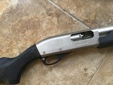 REMINGTON 870 “MARINE” STAINLESS 12 GA. MAGNUM,
18” CYLINDER BORE BARREL, NEW UNFIRED IN THE BOX WITH OWNERS MANUAL, ETC. - 4 of 8