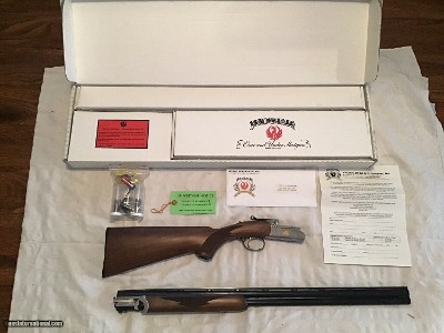 RUGER RED LABEL “50TH ANNIVERSARY 1949-1999” 28 GA. ENGRAVED WITH GOLD GROUSE ON THE RECEIVER, NEW UNFIRED IN THE BOX WITH PAPERS, CHOKE TUBES