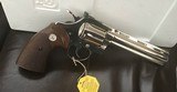 COLT DIAMONDBACK 22 LR., 6” BRIGHT NICKEL, NEW UNFIRED, UNTURNED, IN THE BOX WITH OWNERS MANUAL, HANG TAG, ETC. - 2 of 7