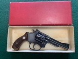 SMITH & WESSON KIT GUN, PRE MODEL 34, 22 LR., I FRAME, 4” BLUE, SERIAL NO. 2480, MFG. 1950, 99% COND. IN THE BOX - 1 of 5
