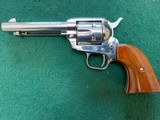 COLT FRONTIER SCOUT 22 LR., 4 3/4” BARREL,
BRIGHT
NICKEL, APPEARS UNFIRED, 99+% COND. - 2 of 4