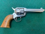 COLT FRONTIER SCOUT 22 LR., 4 3/4” BARREL,
BRIGHT
NICKEL, APPEARS UNFIRED, 99+% COND. - 1 of 4