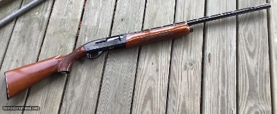 REMINGTON 1100, 16 GA., 28
MOD., VENT RIB, 99+% COND.